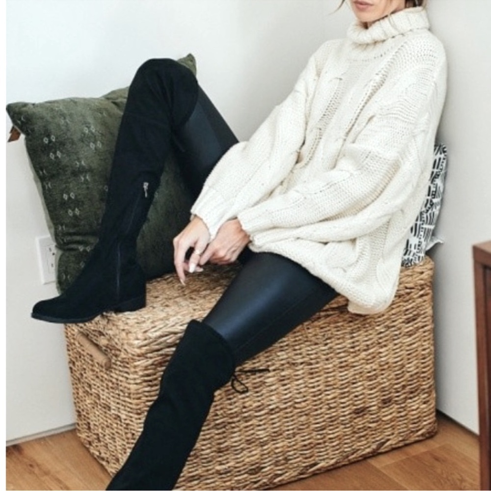 Oversized cream cable turtleneck sweater